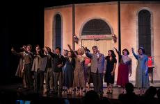 Theatre students performing on stage