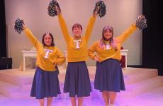 Three Theatre students acting as Cheerleaders