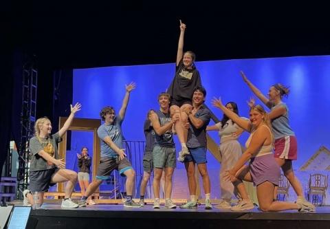 Theatre students rehearsing on stage Theatre students rehearsing on stage