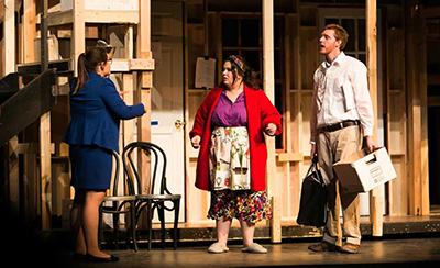 Sterling College students Courtney Swanson, Katie O’Brien and Will Dutton rehearse for “Noises Off,” the farcical comedy that includes slapstick comedy, missed cues, friction between actors, vanishing props, a lot of door slamming and flying sardines.