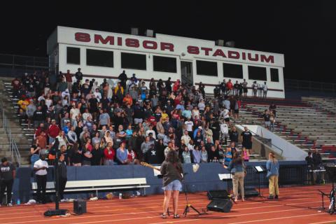 Football stadium of people singing Football stadium of people singing