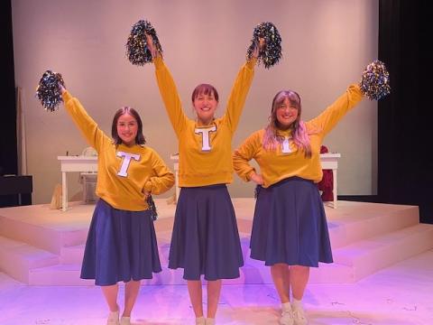 Three Theatre students acting as Cheerleaders