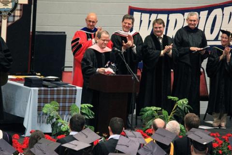 Nix accepts the William McCreery Teaching Award to much applause.