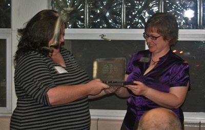 Sasha Hildebrand receives the Sterling College Alumni Award.